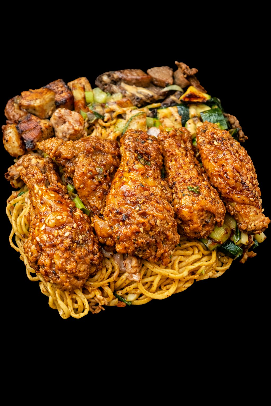 Hibachi chicken wings over garlic noodles